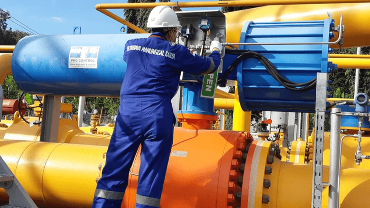 TMK engineer working on an actuated valve at a client facility